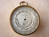 Late 19th Century Hicks pocket barometer with curved thermometer
